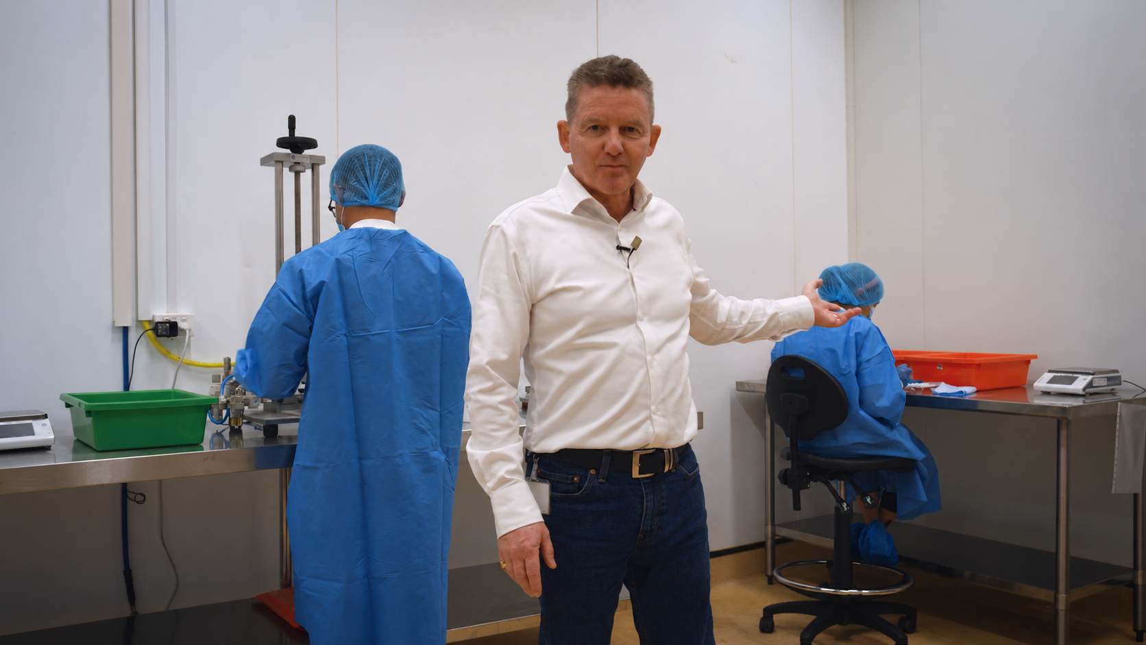 Peter Comerford with his gowned team at the Thornleigh facility